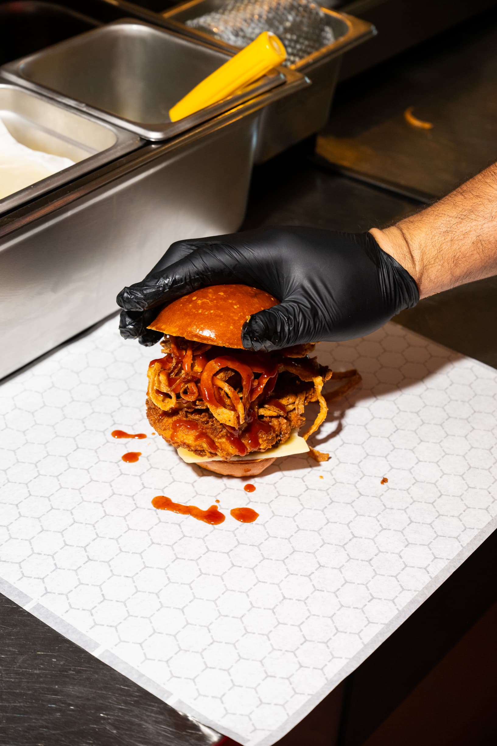 Pluma BBQ fried chicken sandwich with smoky sauce