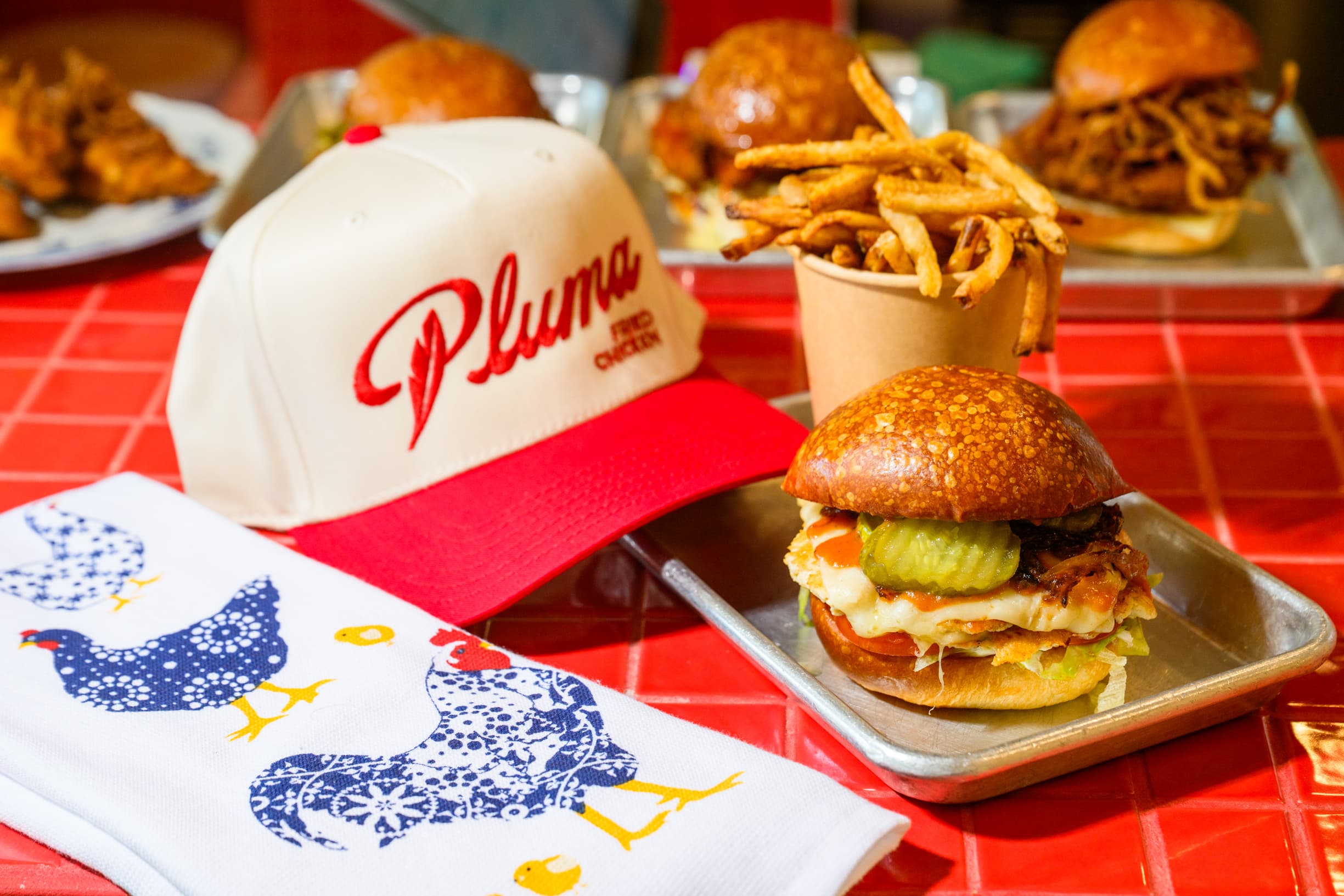 A complete Pluma order including grilled items on a tray